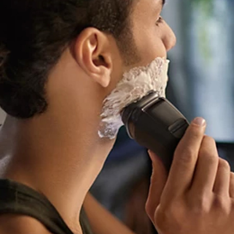 ماشین اصلاح موی صورت فیلیپس مدل X3021 با تیغه استیل ضد زنگ، اصلاح چرخشی و صفر زن، استفاده خشک و مرطوب، شارژ سریع 5 دقیقهای، شارژ کامل 60 دقیقهای برای 40 دقیقه استفاده، ضد آب و قابل شستشو و طراحی ارگونومیک