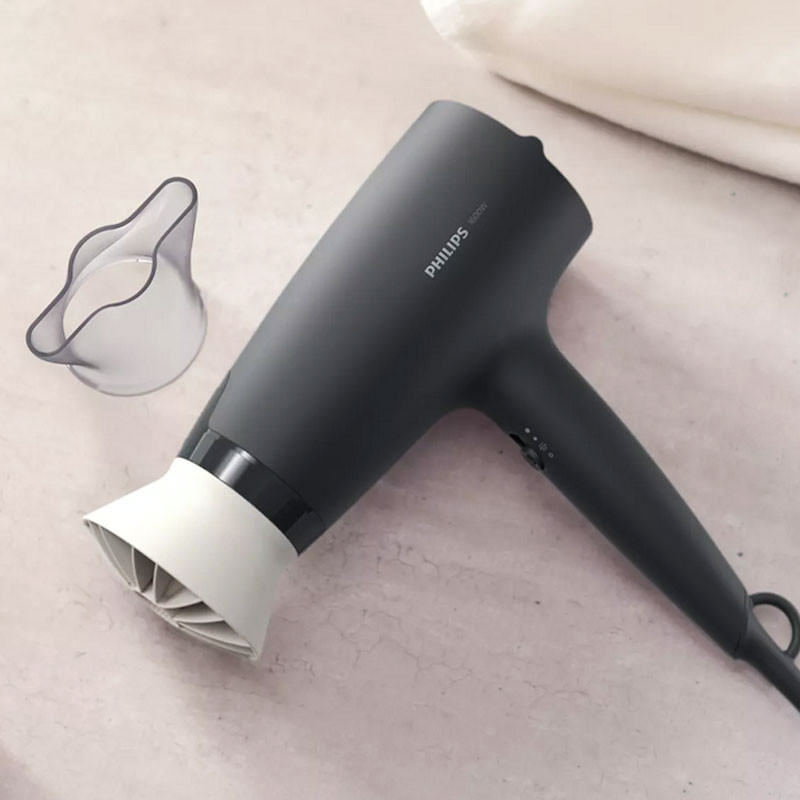 سشوار خانگی 1600 وات فیلیپس مدل BHD302، موتور DC، وزن 280 گرم، دارای سری متمرکزکننده باریک، خشککن ملایم با ویژگی صافکنندگی، با قابلیت باد سرد